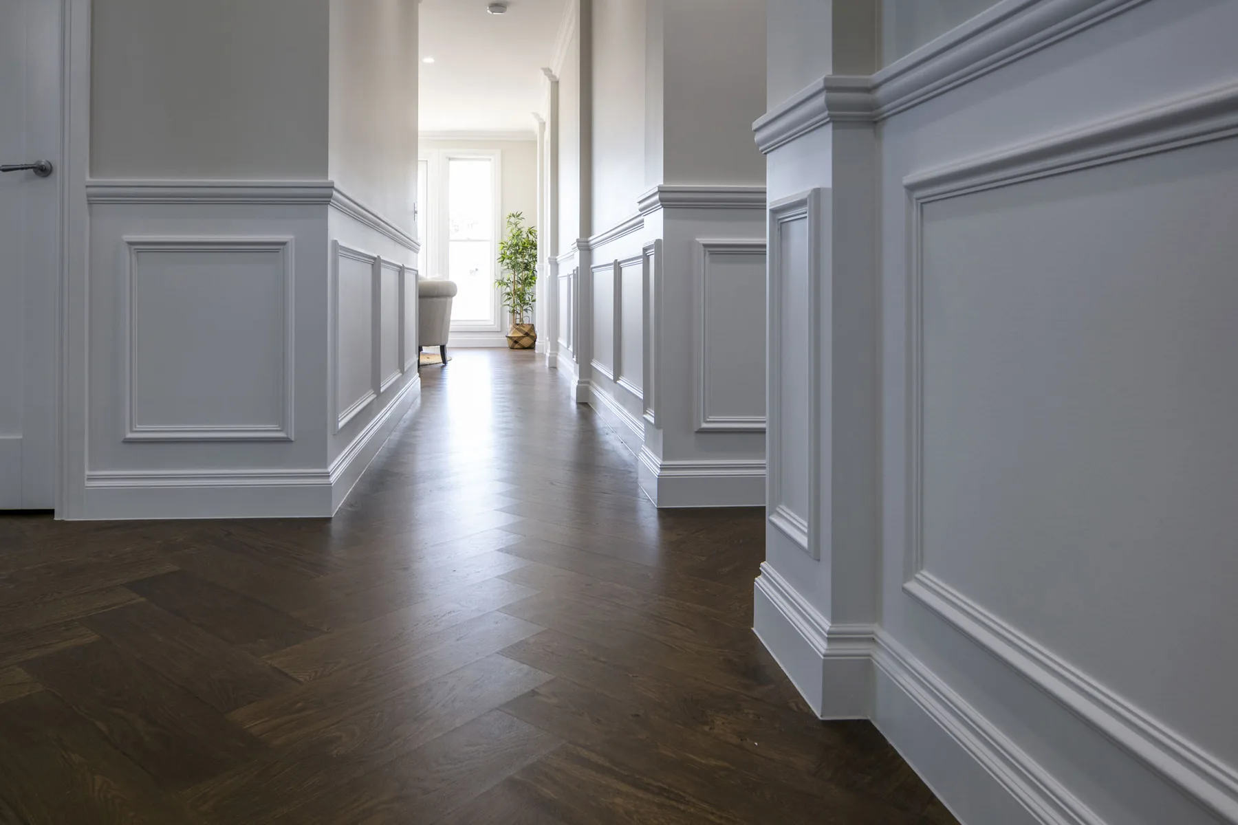 Completed S2F interior showing an even wall finish and crisp painted moulding